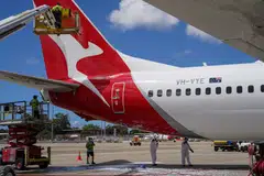 Qantas said it was rolling out a range of initiatives to improve on-time performance and mishandled baggage.