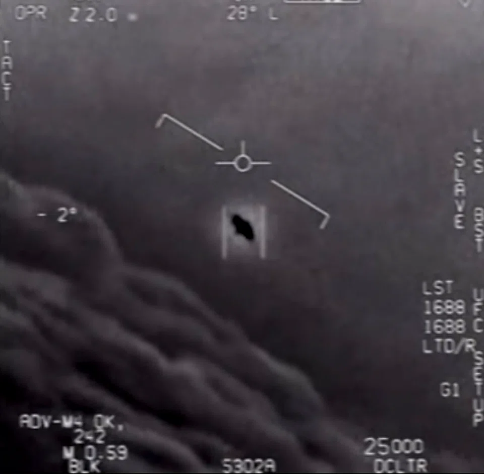 This video grab image obtained April 28, 2020 courtesy of the US Department of Defense shows part of an unclassified video taken by Navy pilots that have circulated for years showing interactions with "unidentified aerial phenomena" .
