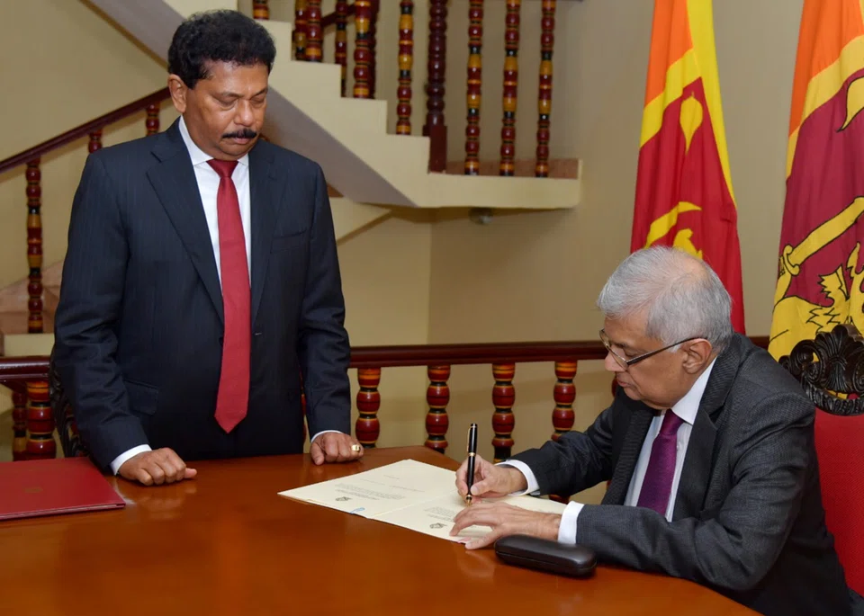 Sri Lankan Prime Minister Ranil Wickremesinghe (right) was sworn in as president last Friday (Jul 15), after his predecessor Gotabaya Rajapaksa fled to Singapore following months of anti-government protests.
