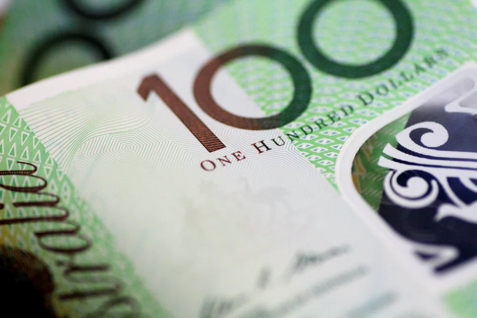 The Australian and New Zealand dollars sank to two-year lows on Tuesday. 