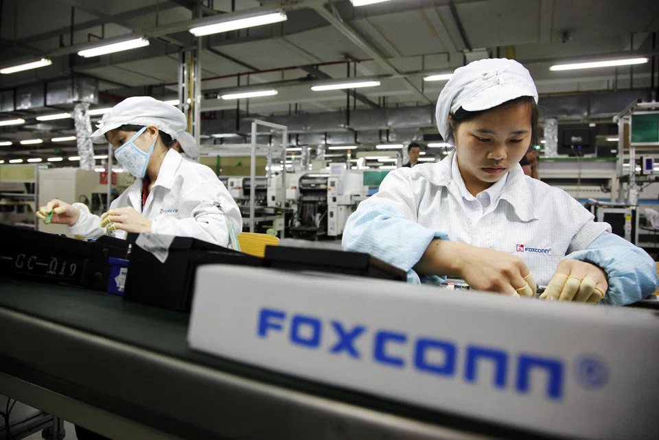 Foxconn, the world’s largest contract electronics maker, reported a 56 per cent plunge in first-quarter net profit, due to a US$553 million writedown related to its 34 per cent stake in Japanese electronics maker Sharp.
