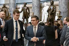 US House Speaker Mike Johnson (centre) at the Capitol in Washington, Jan 18, 2024. Despite the urgency, dozens of conservatives in the House voted against the stop-gap measure but Democrats provided Republican Speaker Johnson enough backing to smooth its passage.