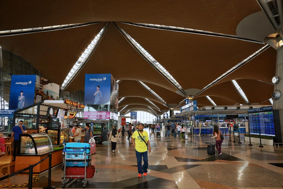 Malaysia Airports Holdings operates Kuala Lumpur International Airport (pictured) in Malaysia. Analysts see the company's earnings improving, but note headwinds from higher costs.