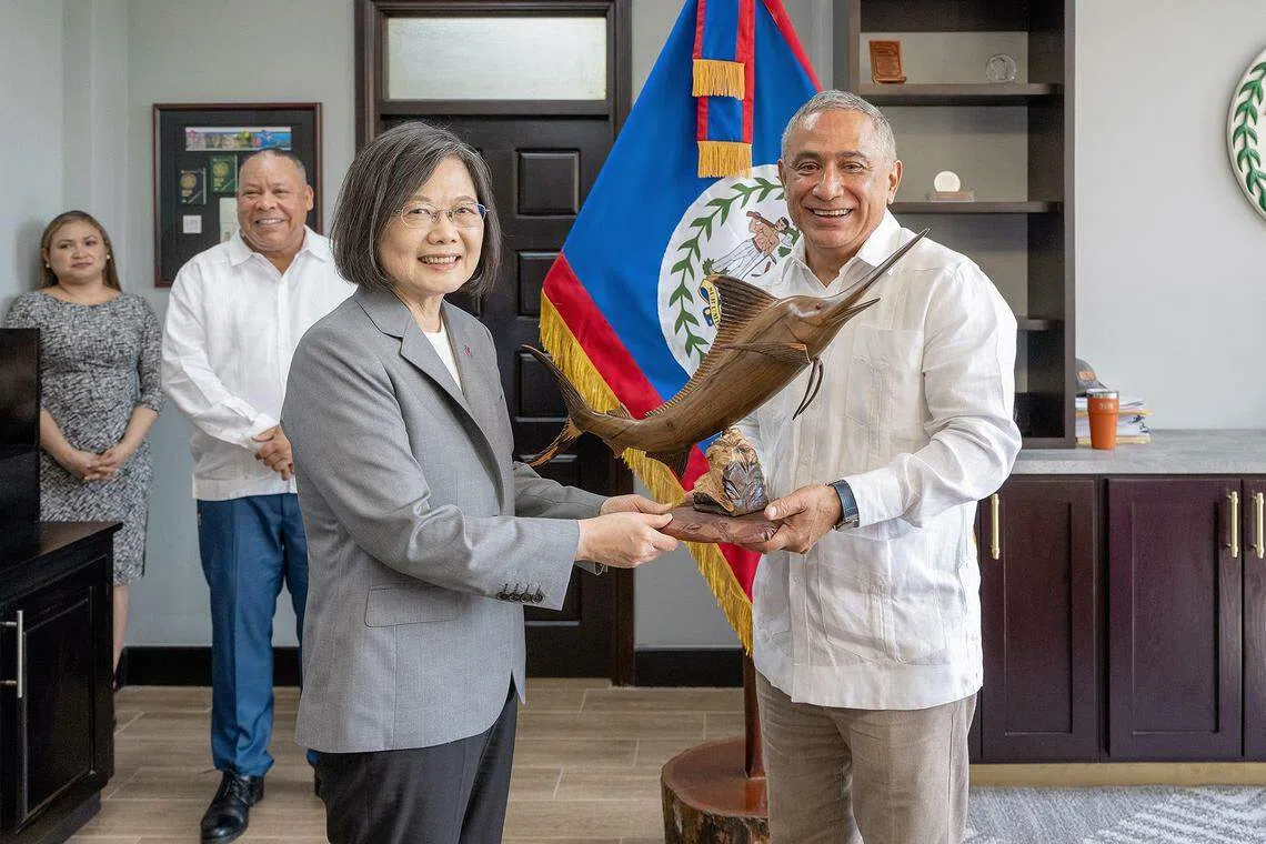Taiwan's President Tsai Ing-wen meets with Belize Prime Minister John Briceno during her visit to the Central American country, April 3, 2023.
