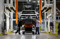 Workers assembling an truck at Foxconn's production facility in Lordstown, Ohio, US; the company has big ambitions in the EV market as it seeks to diversify its revenue base. 