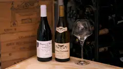 Bottles of vintage wine in the Provenance Treasures portfolio. Both carry "Grand Cru'' appellations.