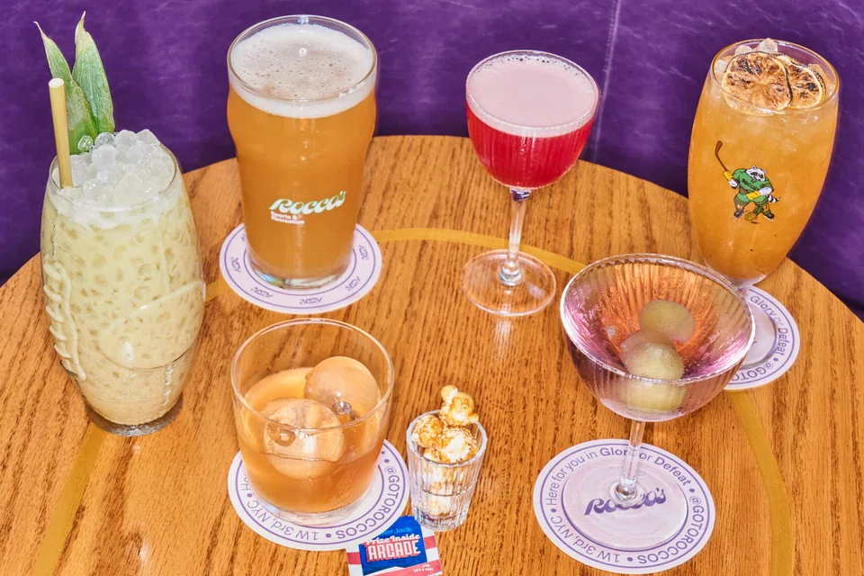 Cocktails and their respective glass styles at Rocco's Sports & Recreation in New York.