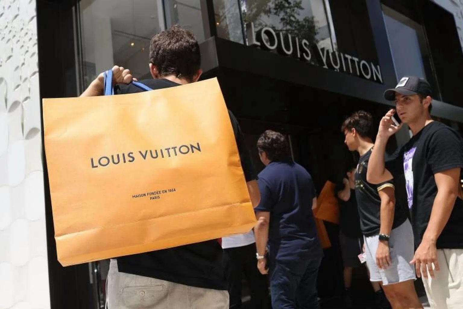LVMH's Louis Vuitton launches e-commerce website in China - The ...