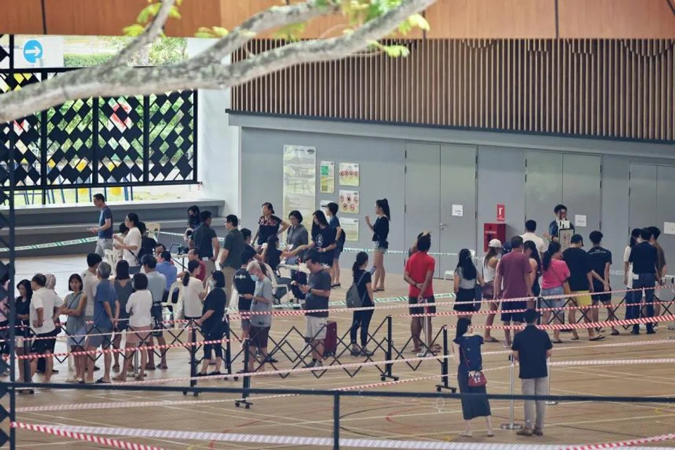 Voters queue at the polling station at Wisma Geylang Serai on Sep 1, 2023. 