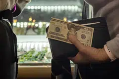 As more people slowly buy homes and cars at higher interest rates, more consumers will face larger payments that could leave them with less spending cash. 