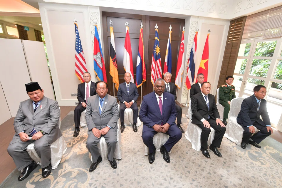 US Secretary of Defense Lloyd Austin (front C) posing for photos with his defence counterparts on the sidelines of the IISS Shangri-La Dialogue in Singapore, 10 Jun 2022. 