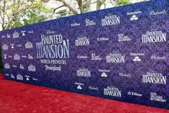 Disney still laid on a red carpet at the theme park’s Haunted Mansion ride, but none of the movie’s stars were in attendance. 