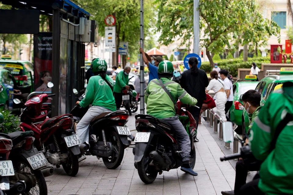 Grab riders and taxi drivers in Ho Chi Minh City, Vietnam. The set of earnings reported on Wednesday (Nov 16) brought Grab's deliveries segment into positive adjusted Ebitda territory for the first time. 