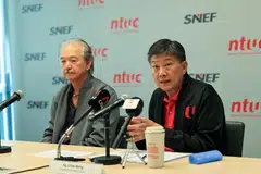 With significant headwinds ahead, both workers and businesses are feeling anxious about the economic outlook for 2024, say NTUC secretary-general Ng Chee Meng (right) and SNEF president Robert Yap.