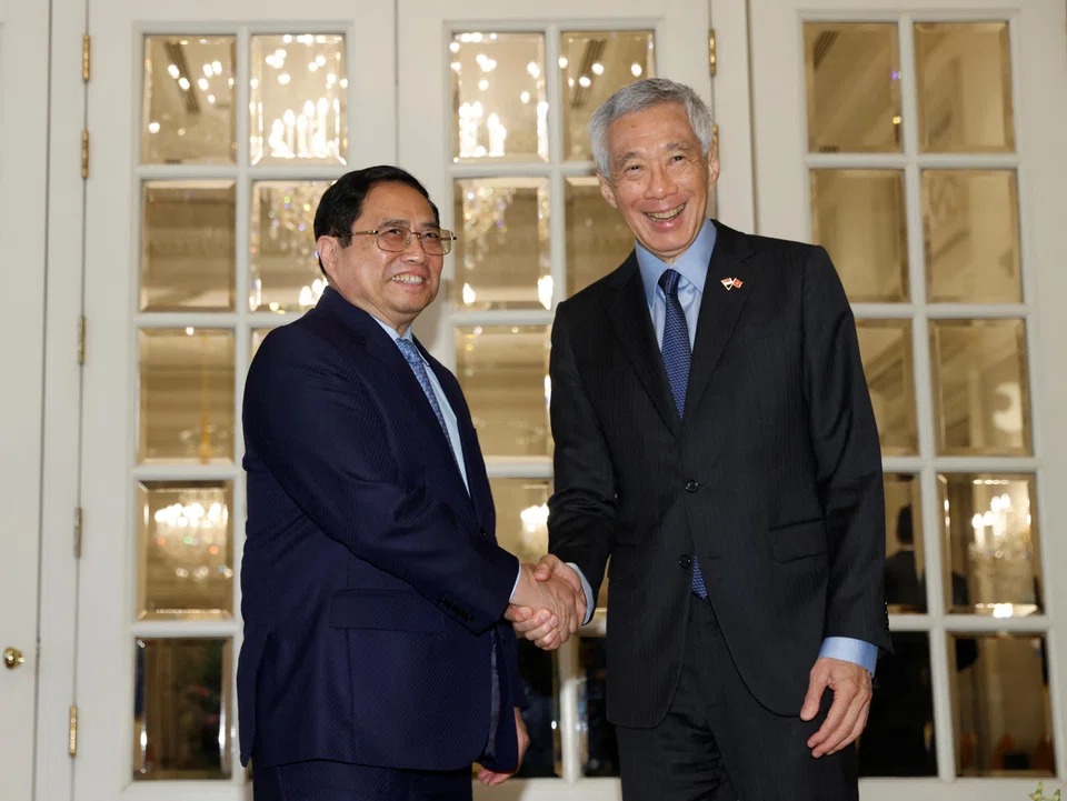 Vietnam's Prime Minister Pham Minh Chinh (left) meeting Singapore Prime Minister Lee Hsien Loong at the Istana on Feb 9, 2023 during his three-day official visit to Singapore.