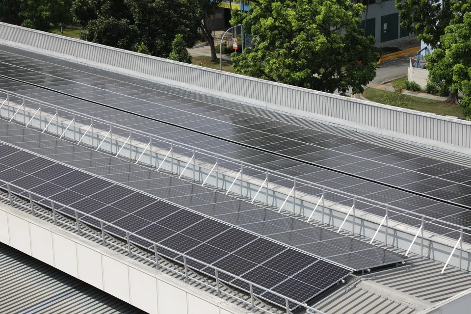 Solar panels at the headquarters of  Sim Siang Choon Hardware in Changi South. The company tapped JTC's SolarRoof programme., which has been extended to privately leased industrial properties.