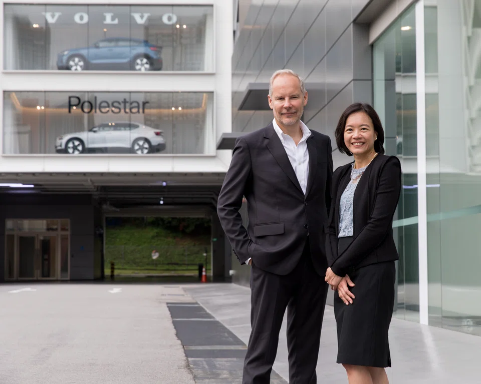Wearnes Automotive chief executive Andre Roy (left) and chief financial officer Katherine Tan. The motor group manages its currency-exposure risks through tailored solutions from HSBC.