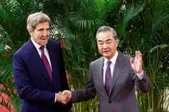 Wang Yi (right) described John  Kerry as “my old friend”, saying they have “worked together to solve a series of problems between both sides”. 