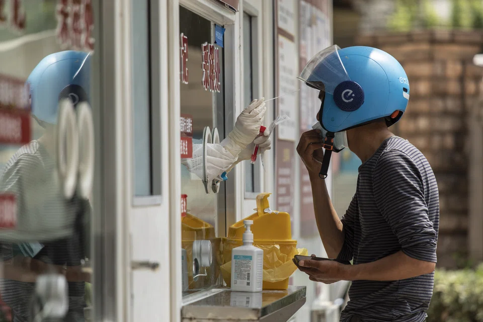 Shanghai briefly locked down most of the city Saturday to undertake mass testing as authorities continue to report Covid cases outside of quarantine areas. 