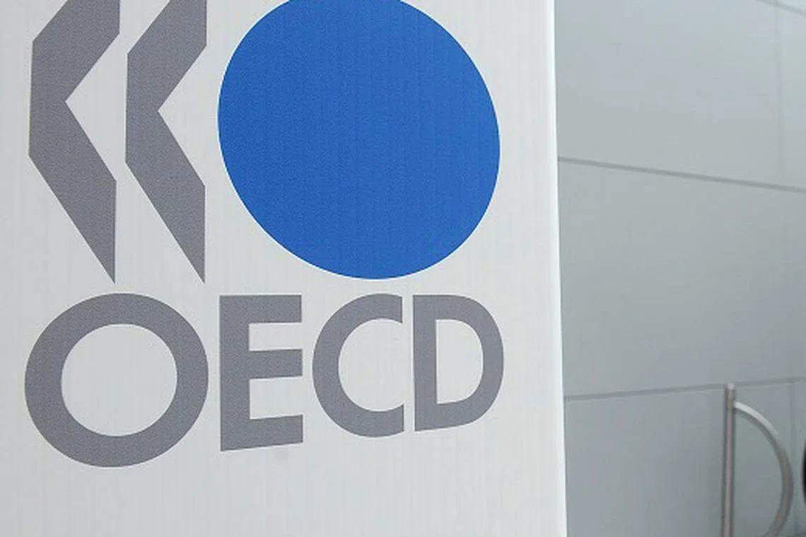 The US will represent roughly half of the total bond debt, twice its share in 2008, while the EU will account for 20 per cent, Japan for 16 per cent and Britain for 6 per cent, the OECD said.