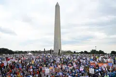 Thousands of gun control advocates protest against gun violence during a rally near the Washington Monument on the National Mall in Washington, DC, June 11, 2022.