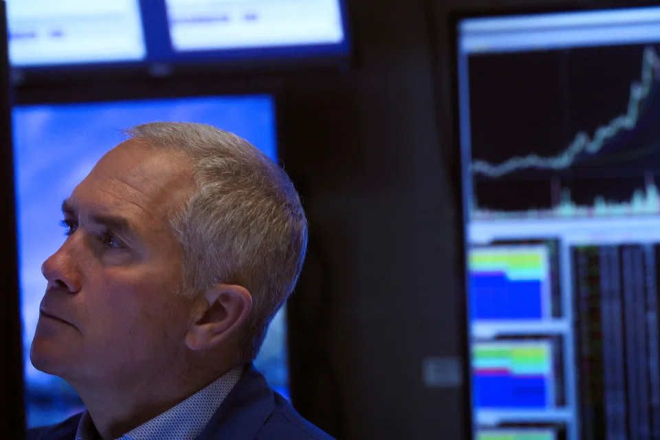 WALL STREET'S main indexes opened lower on Friday (Apr 22) on mixed earnings, while growth stocks cut some losses in a torrid week marked by surging bond yields as investors braced for higher interest rates.