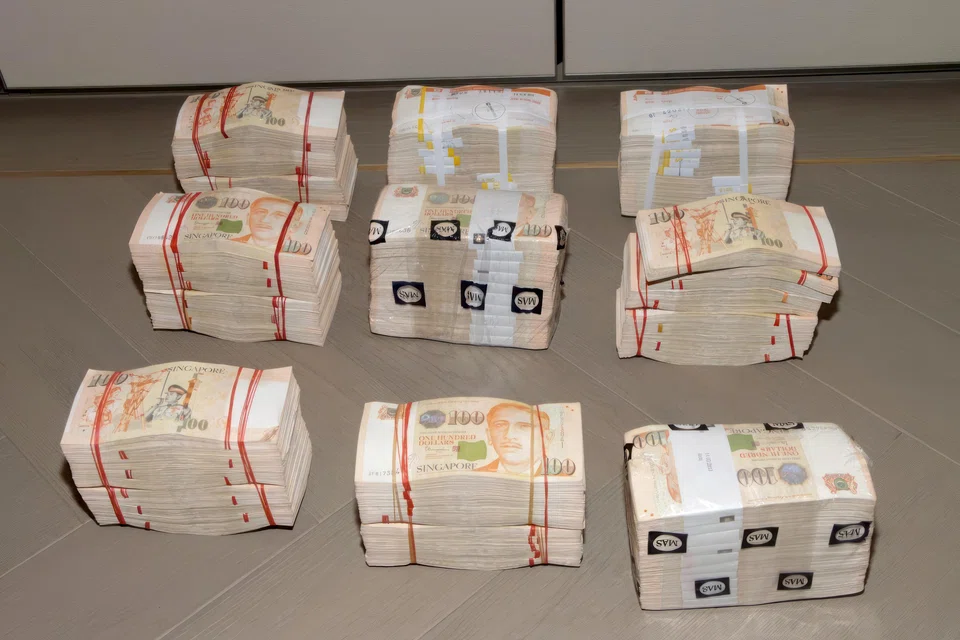 Assets seized or frozen include monies in bank accounts amounting to more than S$1.45 billion and cash of more than S$76 million.