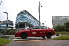 Grab's acquisition of Trans-Cab includes about 2,200 cabs and more than 300 private-hire vehicles.