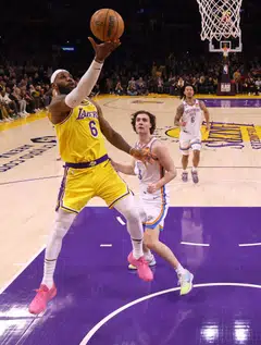 LeBron James of the Los Angeles Lakers scores on his way to passing Kareem Abdul-Jabbar to become the NBA's all-time leading scorer, surpassing Abdul-Jabbar's career total of 38,387 points in Los Angeles on Feb 7.