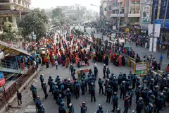Clashes during the protests, which ran alongside wider anti-government demonstrations by the opposition ahead of the Jan 7 general election, killed four workers and injured dozens of others, with the police filing cases against hundreds of unidentified people for vandalism.