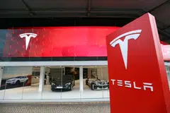 Tesla shares charged ahead, rising as much as 5.3 per cent and on pace to wipe off most of its losses from Friday (Aug 5).