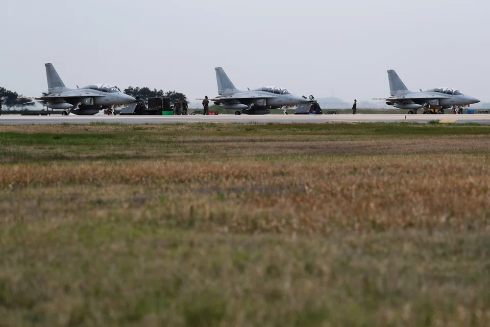 A fleet of FA-50 Golden Eagle fighter jets manufactured by Korea Aerospace Industries and Lockheed Martin Corp at a US air base in South Korea, 2017.  