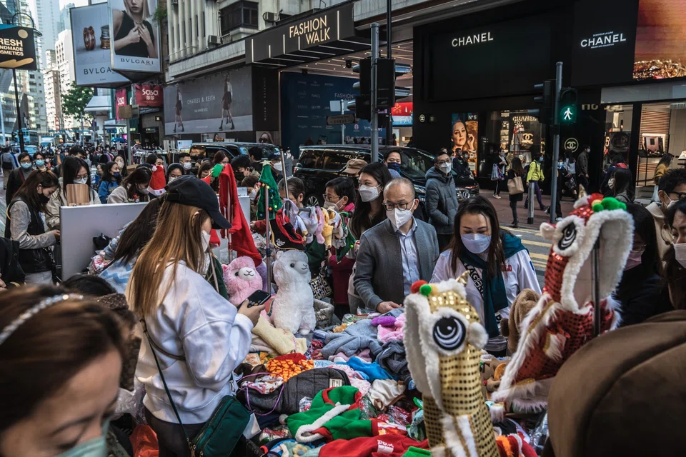 Economists are upgrading their forecasts for Hong Kong this year as the city accelerates its reopening with mainland China and the rest of the world. 