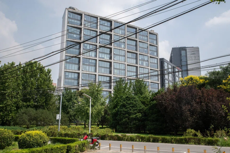 A building which houses the headquarters of Zhongzhi Enterprise Group in Beijing. The company has hired KPMG to review its balance sheet amid a worsening liquidity crunch.