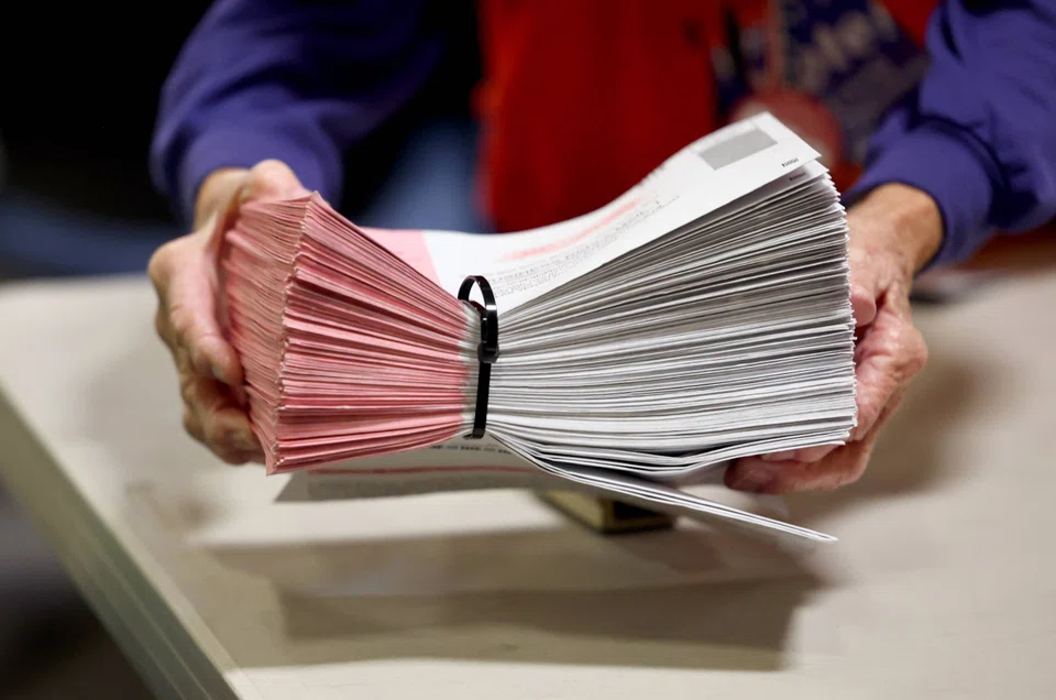 Officials overseeing vote counting in the Arizona and Nevada (top) Senate races, where Democratic incumbents are trying to fend off Republican challengers, say it could take until next week to tally uncounted mail-in ballots.