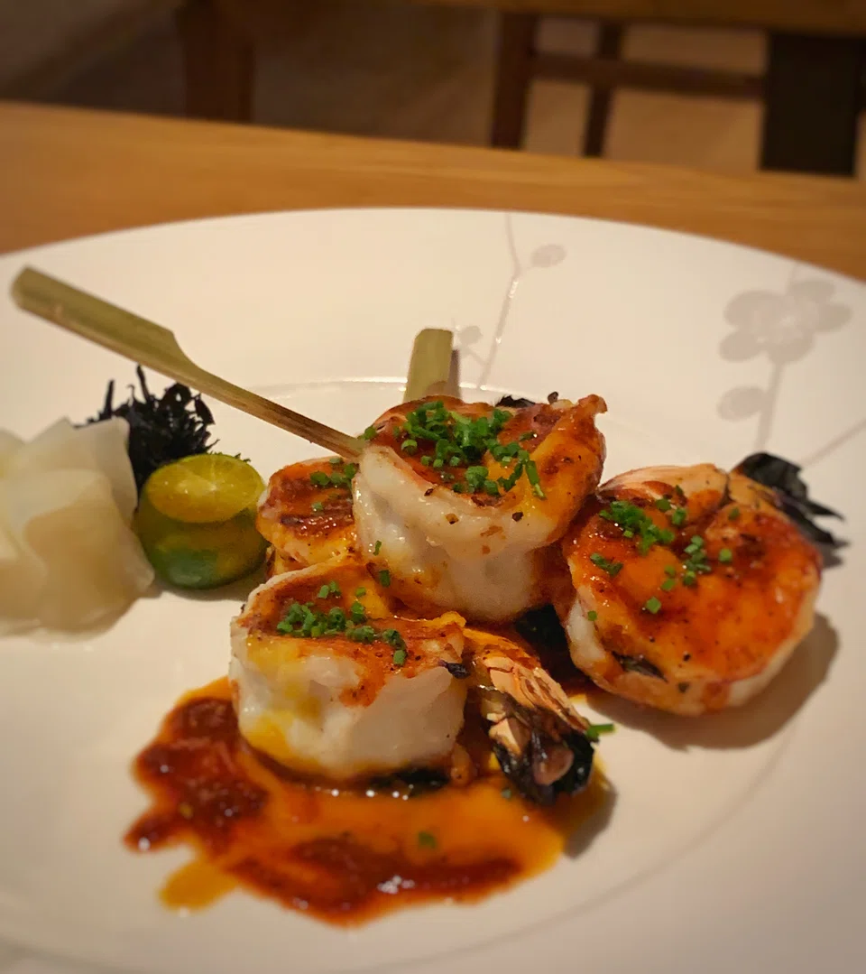 Prawn kushiyaki in a pungent, salty anticucho sauce.