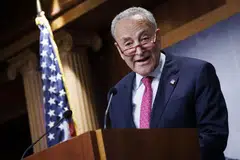 Senate Majority Leader Chuck Schumer says that despite “intense discussions” that were continuing among top lawmakers to break the impasse, Republican recalcitrance is raising the prospect of a “disruptive shutdown” at midnight on Friday.
