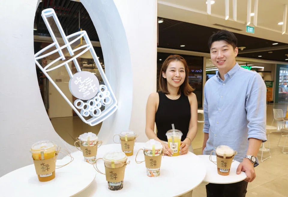 YKGI's chief executive Seah Qin Quan (right) and chief marketing officer Seah Kun Miao are looking to use the proceeds from the listing for expansion across the brands. 