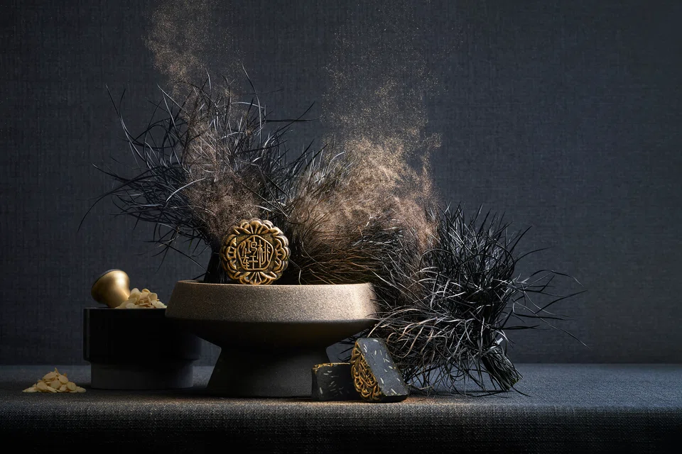 Peach Blossoms' Charcoal Black Sesame Paste with Melon Seeds and Gold Dust.