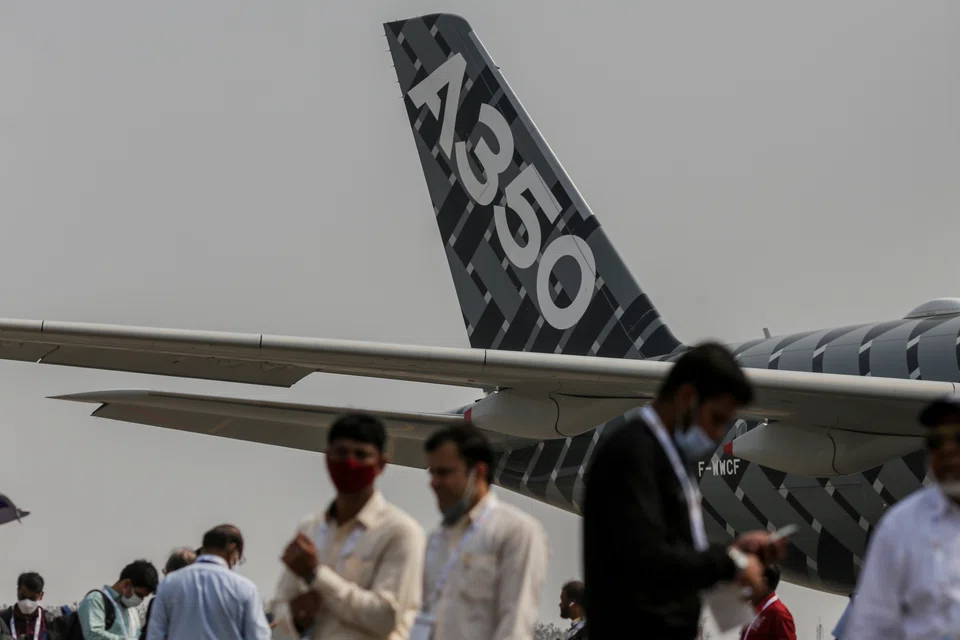 Gulf carrier Emirates said it's in talks to take delivery of A350 wide-body jets ordered from Airbus over a shorter period amid continuing uncertainty around the handover of Boeing's delayed 777X model. 