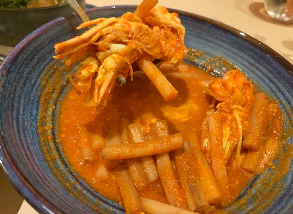 Sour orange curry with river prawns and Thai lotus roots.