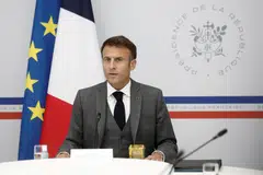 French President Emmanuel Macron attends a video conference with the families of French hostages by the Hamas militants who had entered Israel from the Gaza Strip, at the Elysee Palace in Paris, France, Oct 20, 2023.