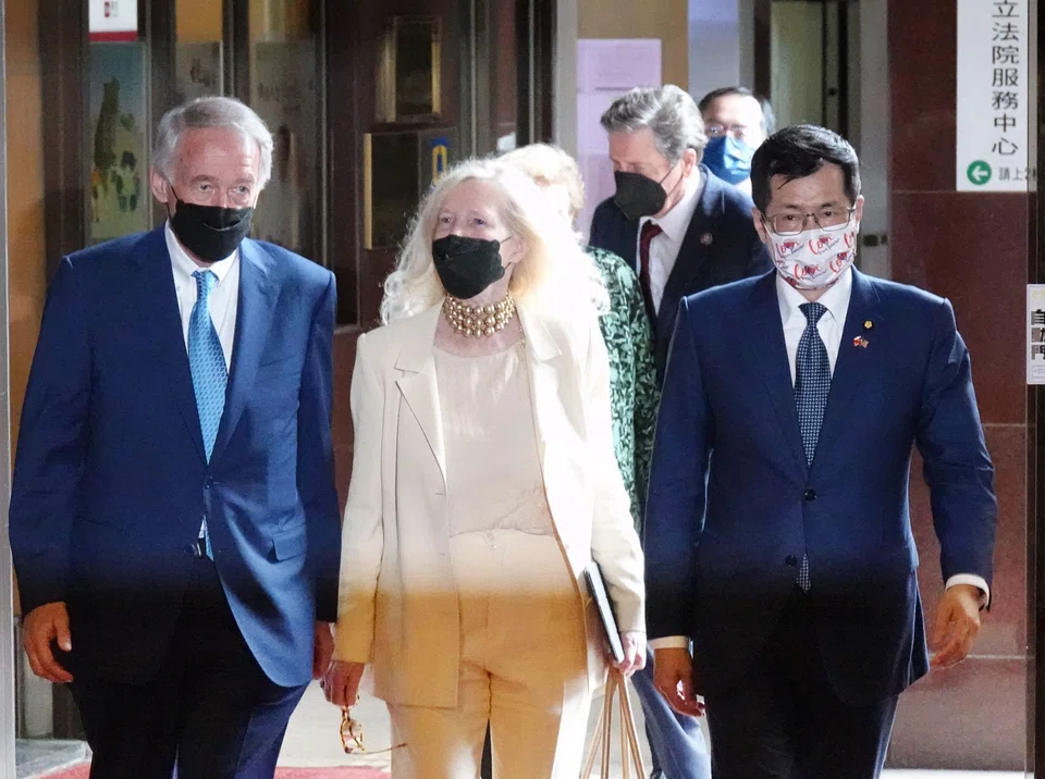 US Senator Ed Markey (left) being escorted by Taiwan's ruling Democratic Progressive Party (DDP) legislator Lo Chih-cheng (right) upon his arrival at the Parliament in Taipei on Monday (Aug 15). 