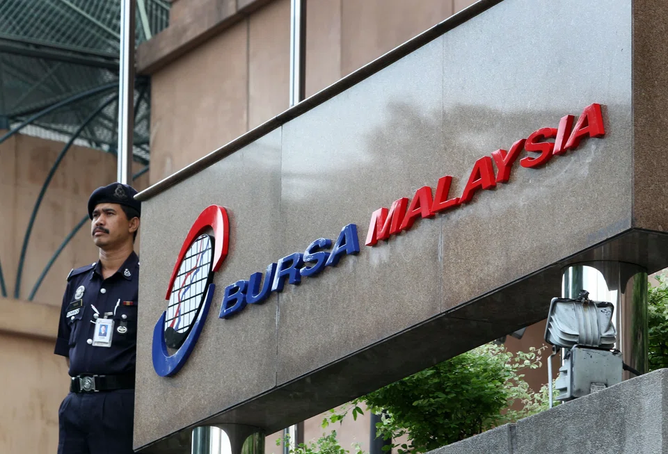A security stands guard  at the Bursa Malaysia Headquarters, in Kuala Lumpur, Malaysia. 