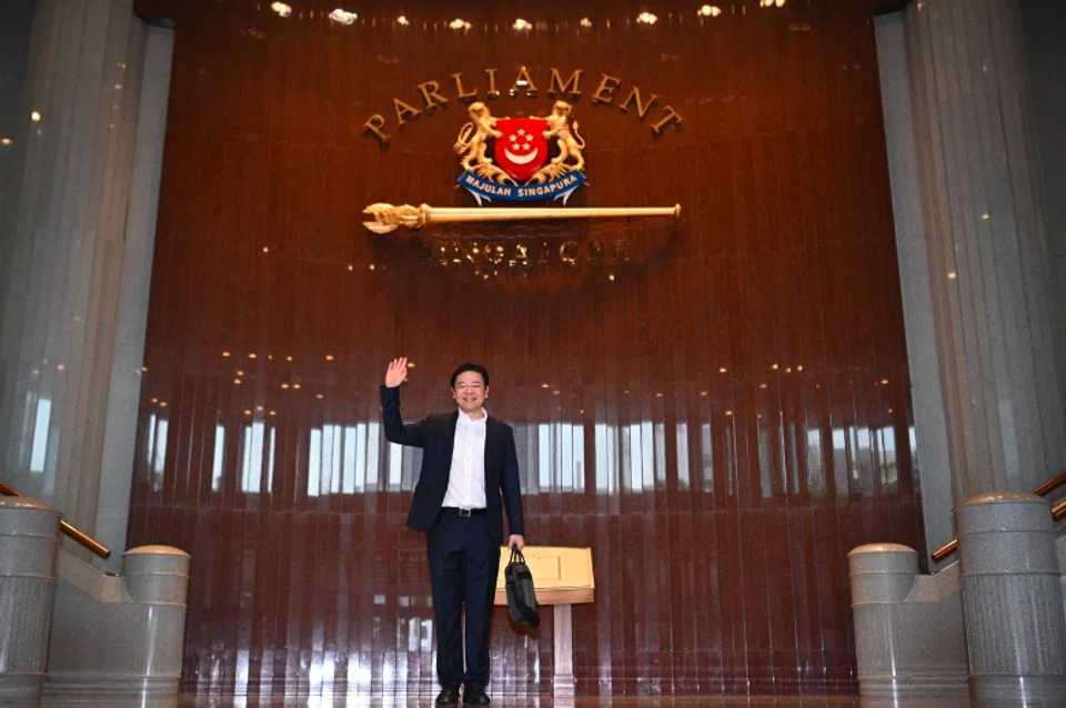 Deputy Prime Minister and Minister for Finance Lawrence Wong arrives in Parliament to deliver this year's Budget statement.