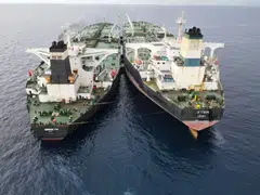 The Iranian flagged vessel MT Arman 114 (left) is captured after being spotted in Indonesia’s North Natuna Sea, carrying out a ship-to-ship oil transfer with the Cameroon-flagged MT S Tinos.
