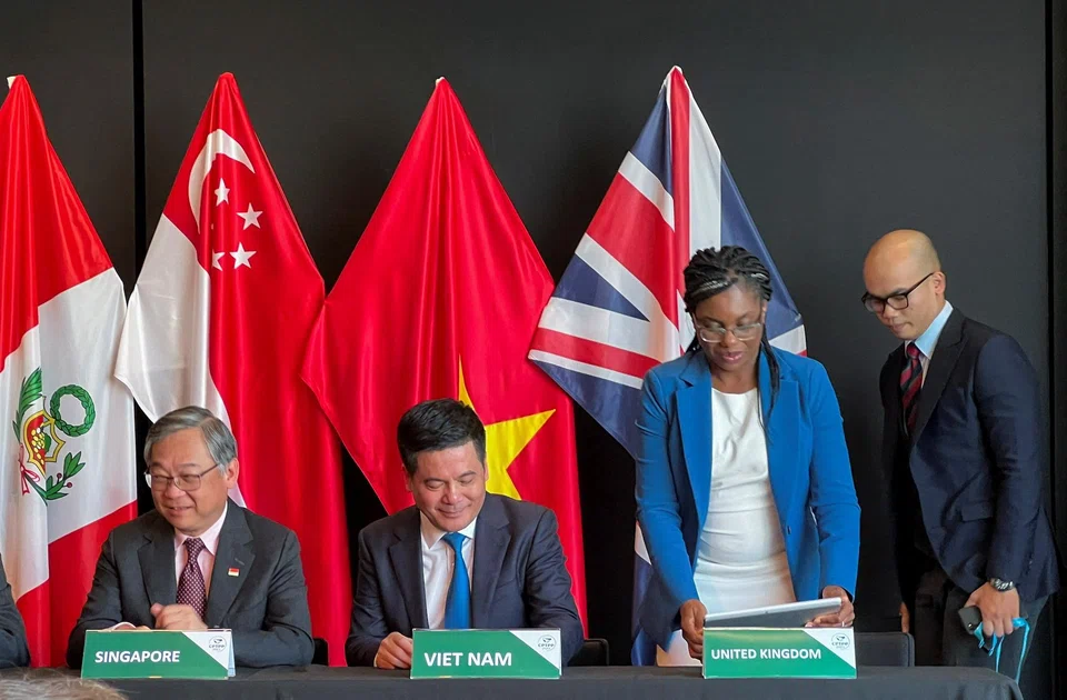 From left: Singapore Minister for Trade and Industry Gan Kim Yong, Vietnam Minister of Trade and Industry Nguyen Hong Dien and British Secretary of State for Business and Trade Kemi Badenoch in July 2023 at the signing of a treaty for the UK to join the CPTPP.