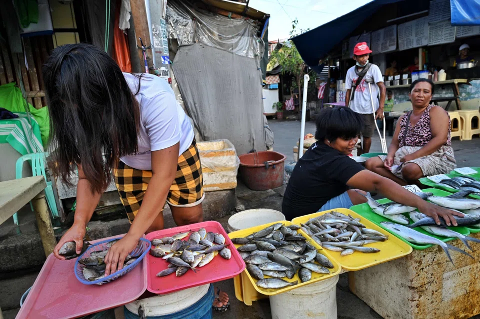 Vendors selling fish at a street market in the Tondo district of Manila. Sonal Varma, an economist at Nomura, said that “we are still far from a recession, higher unemployment rate and double-digit inflation” in the region.