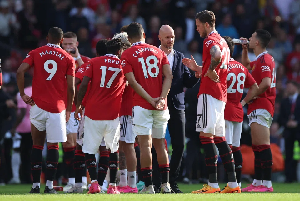 Manchester United manager Erik ten Hag (facing the camera) has already won one trophy in his first season at the club and could add another by beating Manchester City in the FA Cup final on Saturday.
