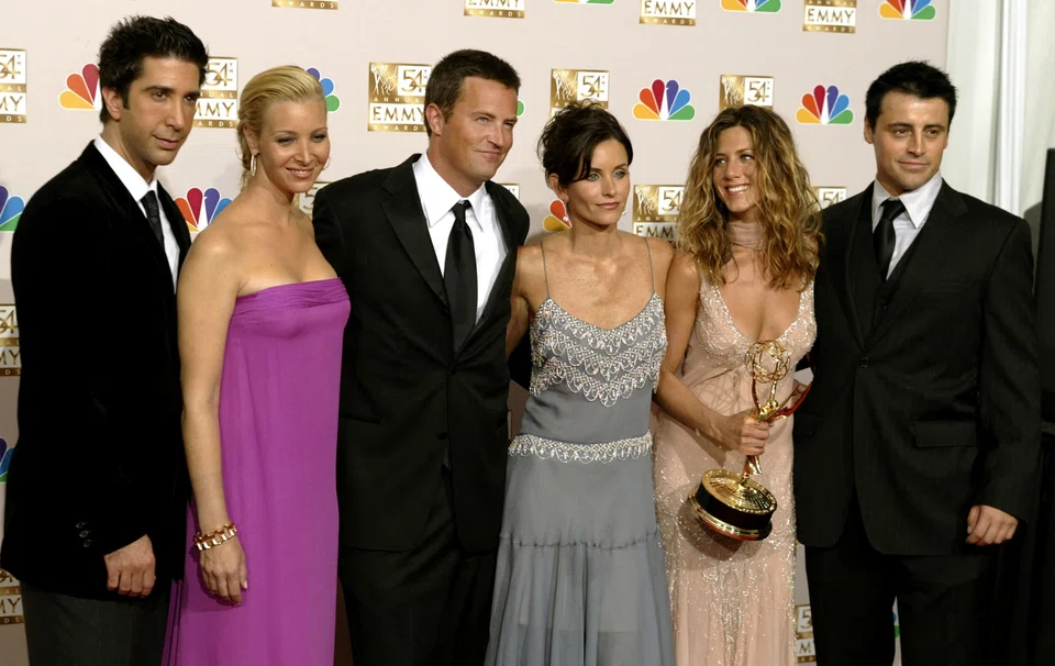 Perry (third from left) was best known for his longtime role as Chandler in the hugely successful Friends.